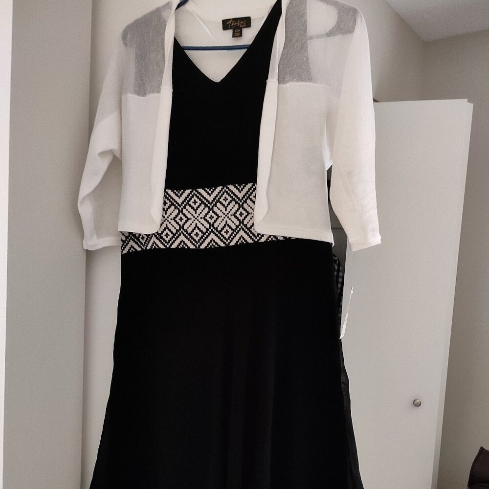 New black asymetric dress with white shrug